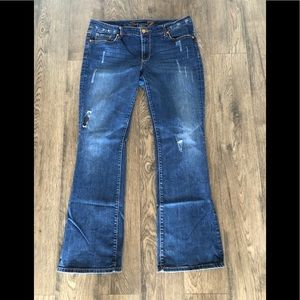 SEVEN7 distressed darker jeans with topaz detail
